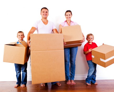 Moving team preparing belongings with safety equipment
