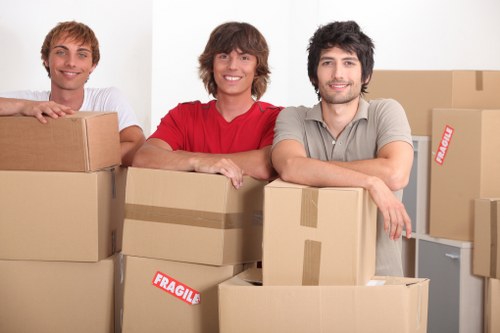 Careful handling of a grand piano during a west London removal