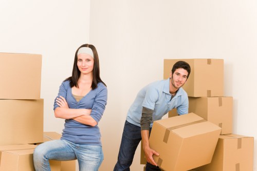 Moving boxes and household items ready for transport in West London