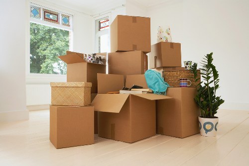 Loading household items into a moving truck in Chiswick